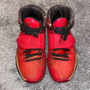 Red and gold Nike Kyrie “All Star/Trophies” 6s